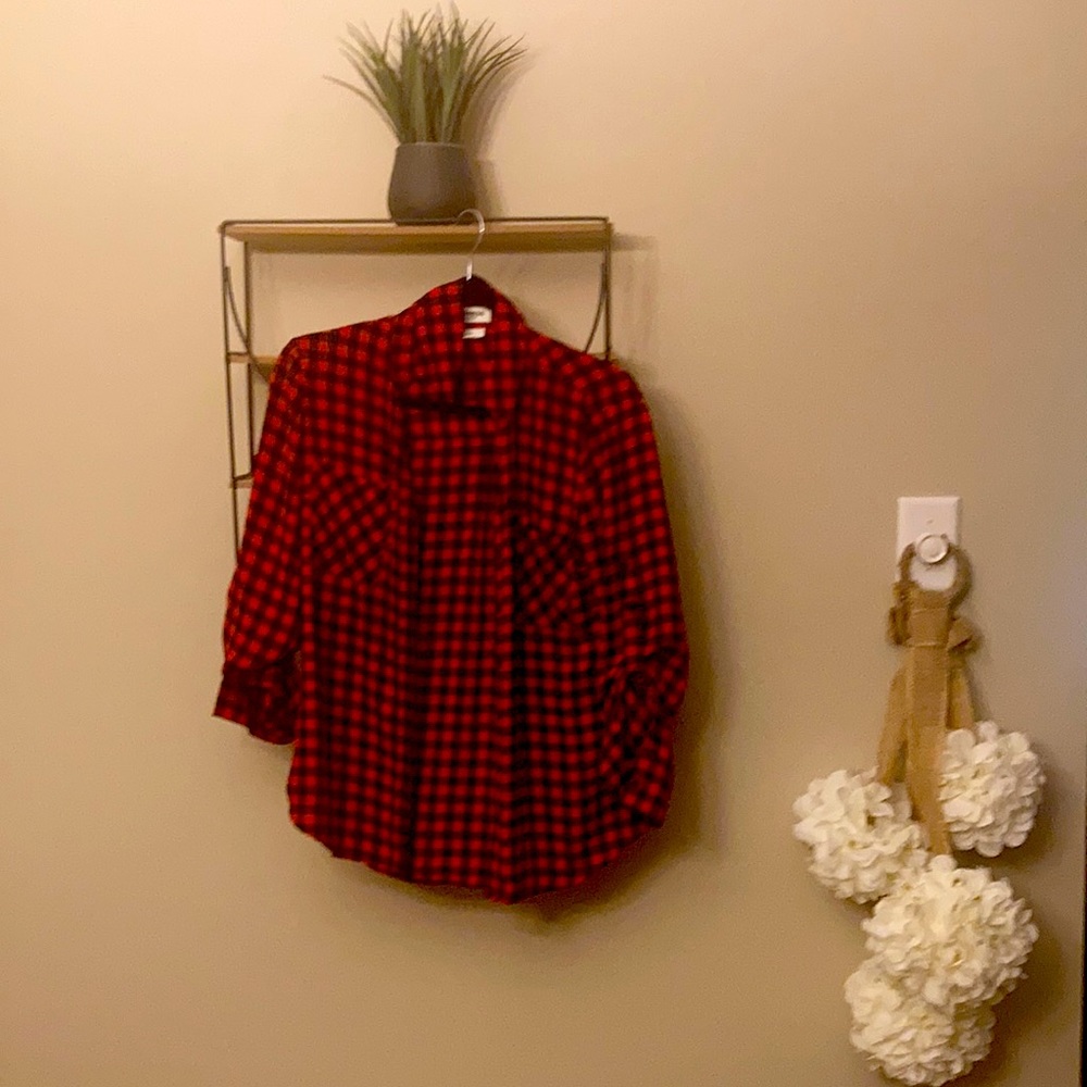 Express black and red blouse .